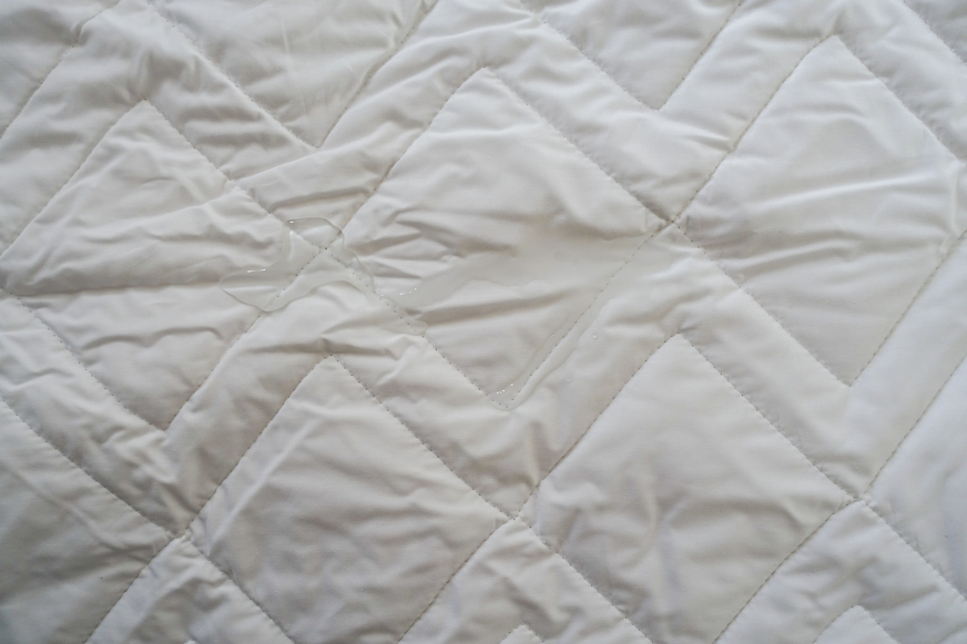 water on the simba mattress protector